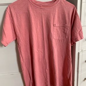 Pink tee shirt with a pocket